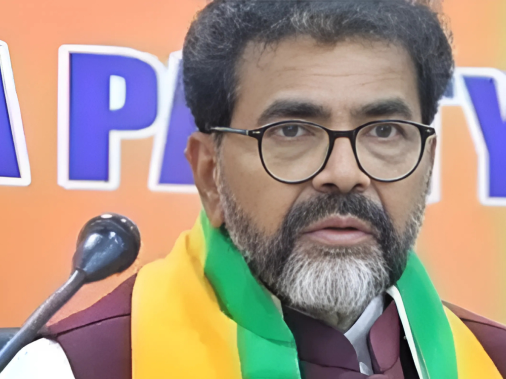 A BJP leader addressing the media, criticizing the Karnataka government for its alleged involvement in microfinance scams and online gaming issues.